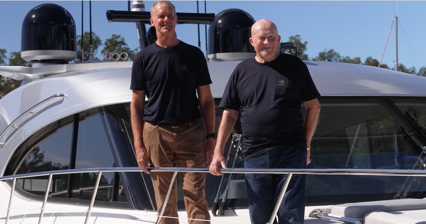 Rivera CEO Rodney Longhurst and owner Peter Haig who bought his 10th Riviera, which happened to be the 6,000th boat the company produced. 