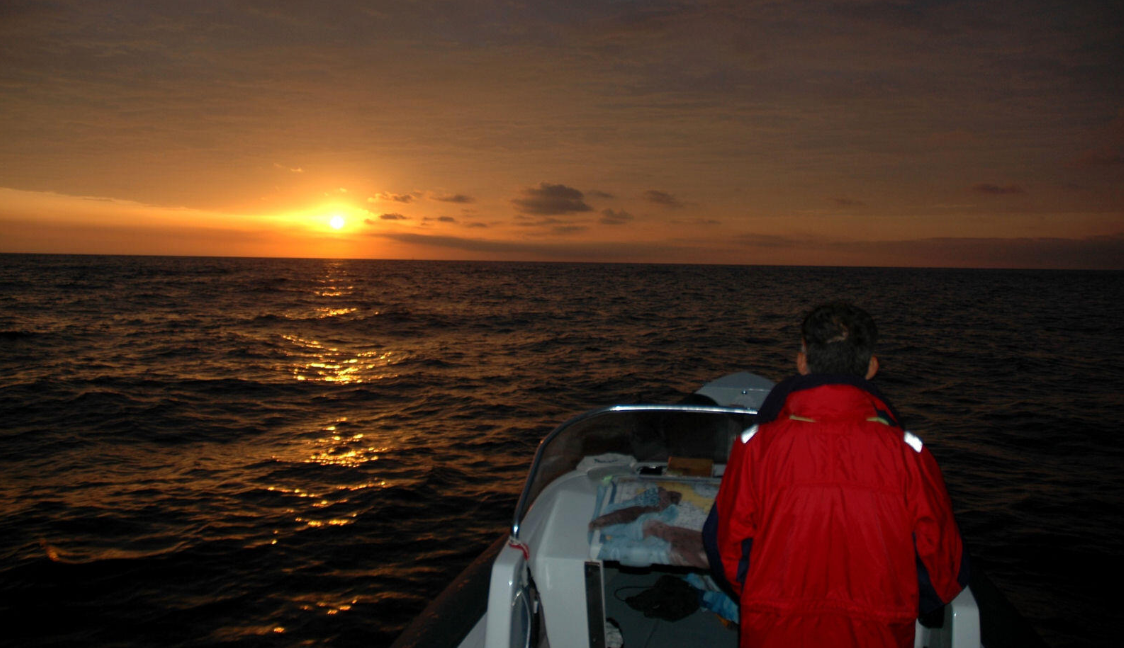 boat at sunset, RIB at sunset
