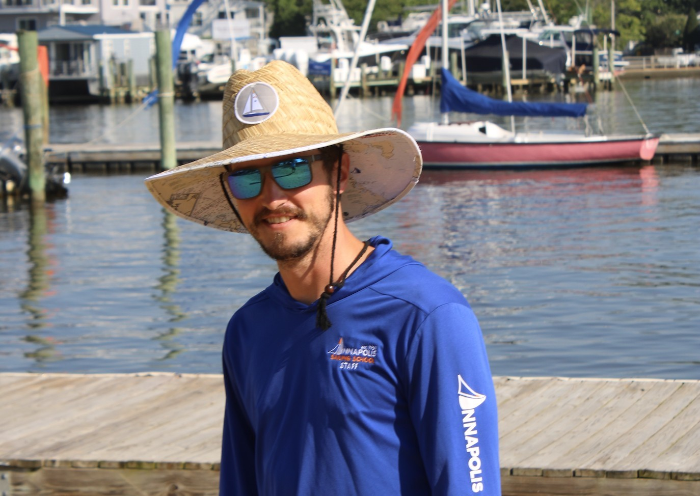 At the Annapolis Sailing School, wide-brimmed hats and long-sleeved tech shirts are encouraged for the greatest amount of sun protection.