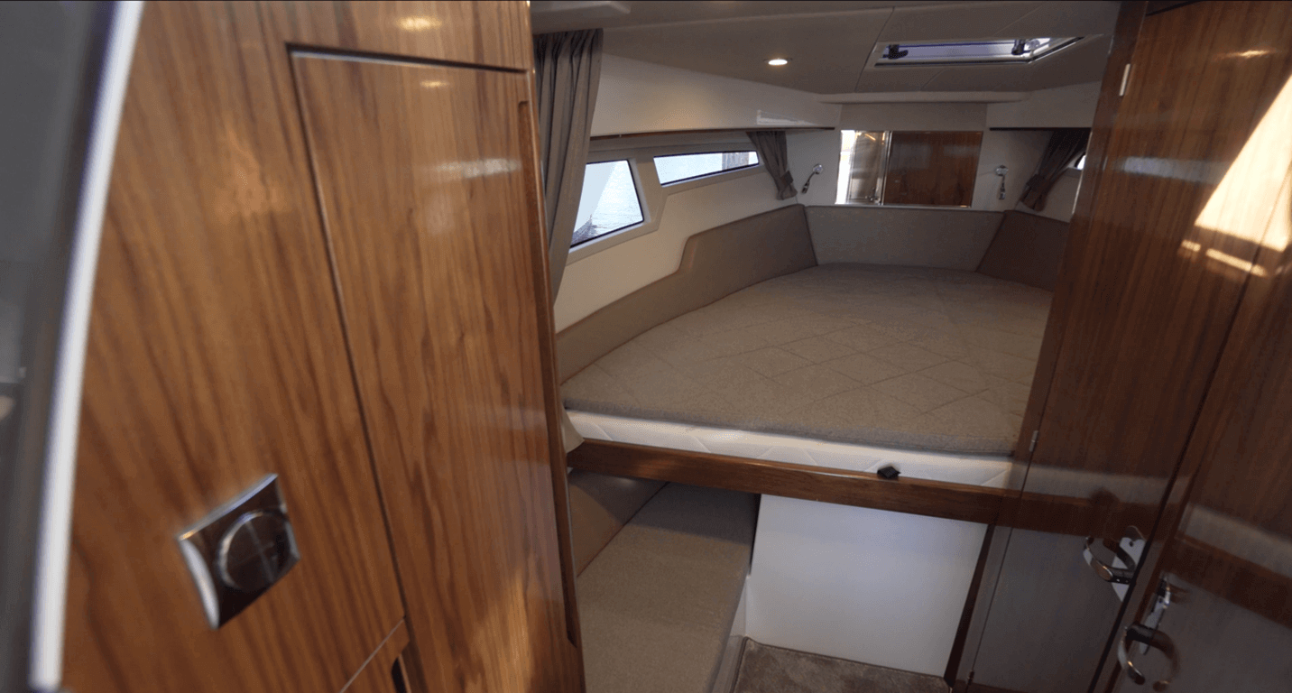 Aquador 300 HT stairway located off the centerline