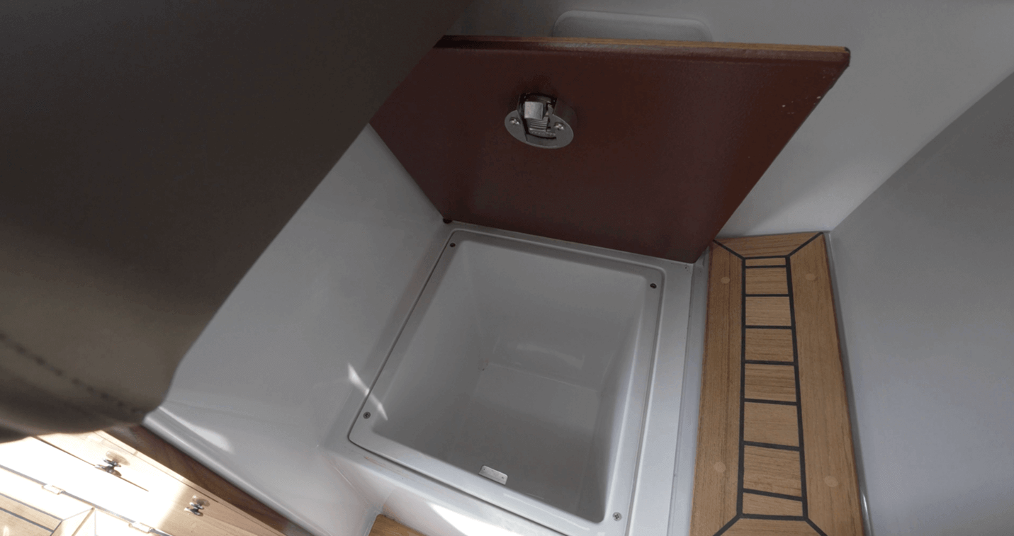 Aquador 300 HT storage space under a deck hatch