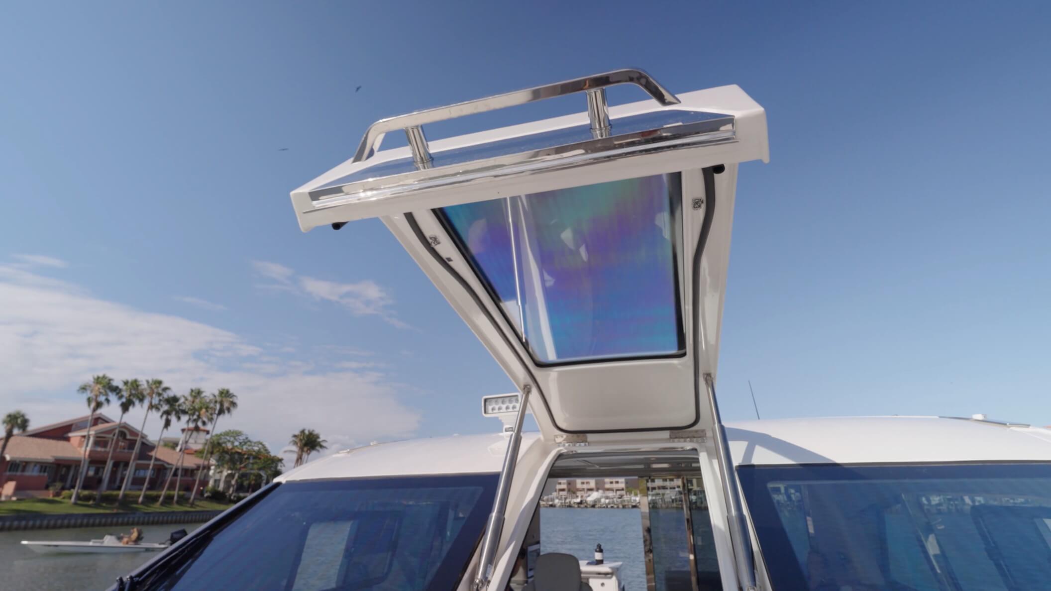 Aquila 42 Coupe Power Catamaran electrically actuated door to allow for passage to and from the bow area
