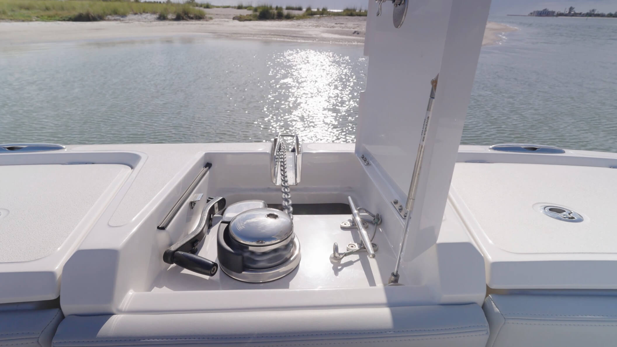 Aquila 42 Coupe Power Catamaran center hatch houses the windlass, chain, and rode