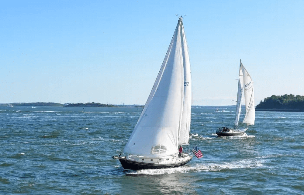 Boston Harbor sloops sailing near islands