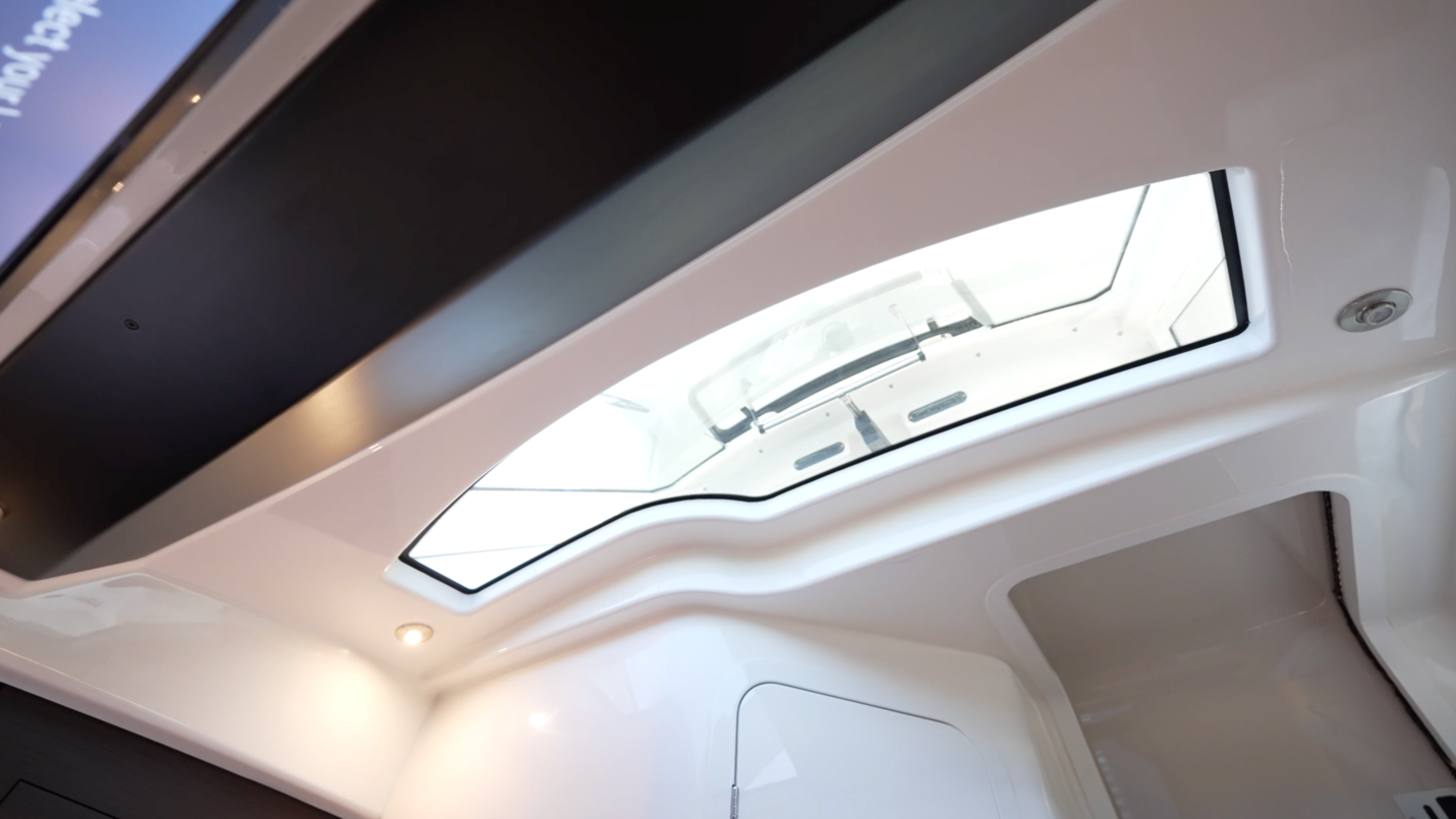 Boston Whaler 350 Realm  Ambient light is provided by the overhead skylight