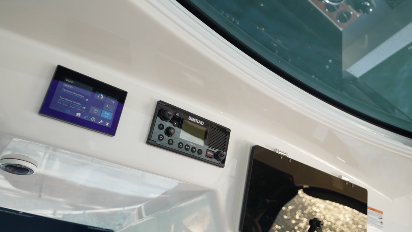 Boston Whaler 380 Realm Seakeeper displays and Simrad VHF control panel