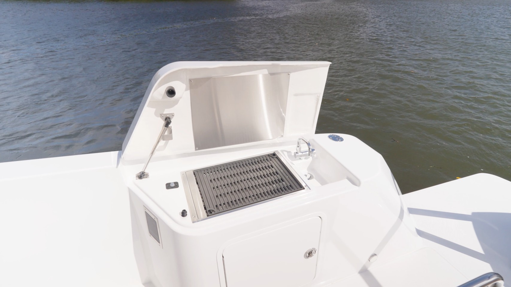 Cruisers 38 VTR EC electric grill, sink, and storage cabinet