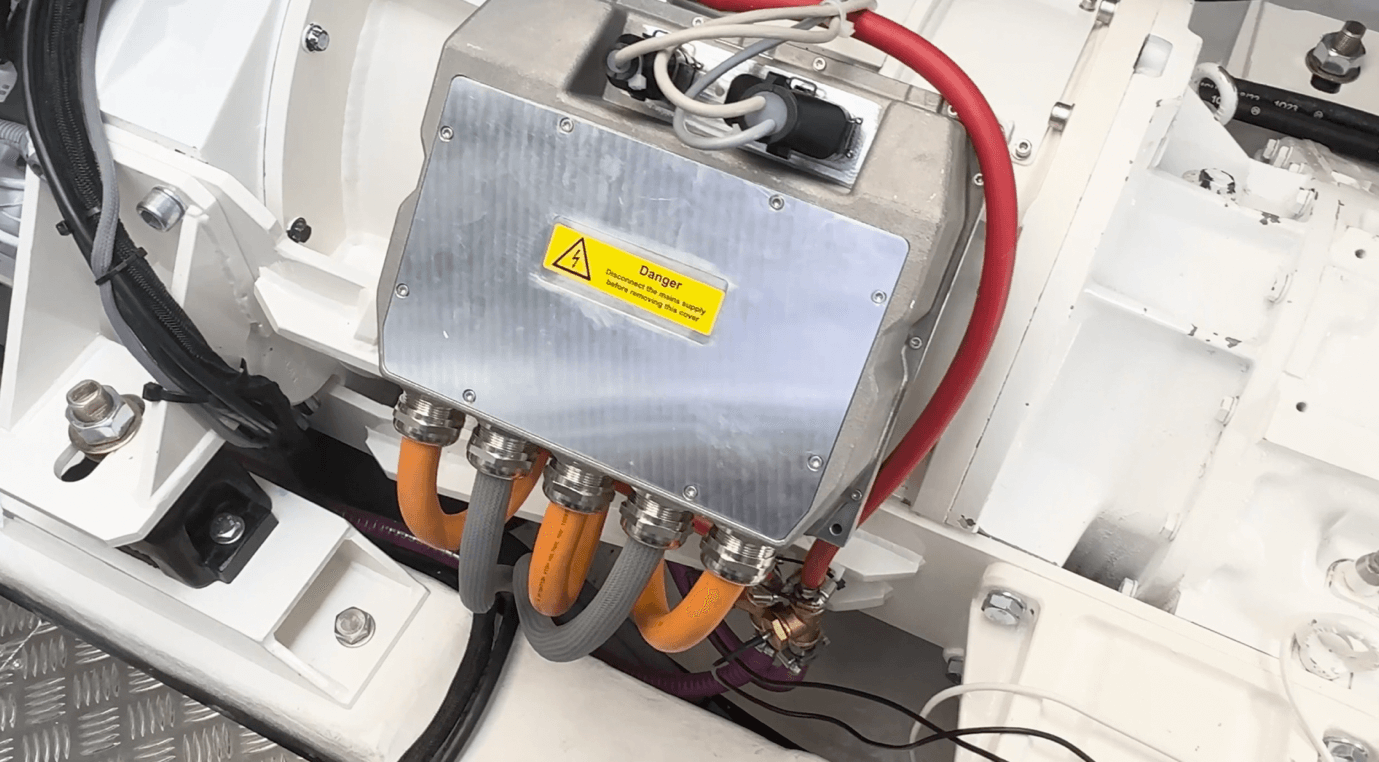 Greenline 58 Fly Hybrid - the box with the cables attached to it contains the brains of the motor/generator to which it’s attached. 