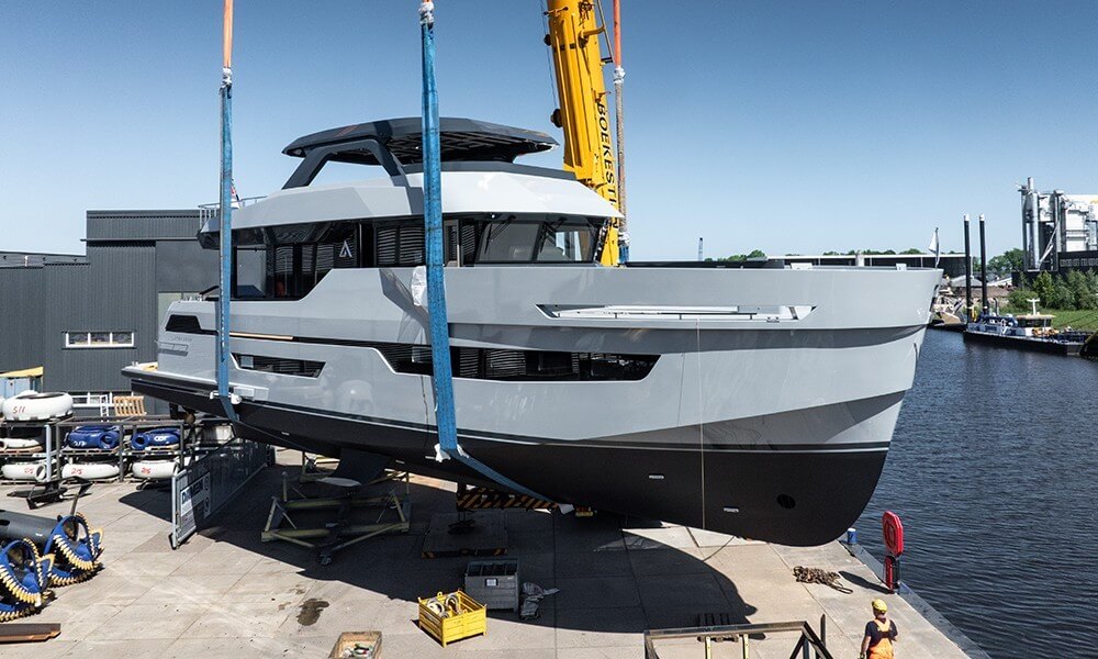 New Outer Reef explorer yacht 780 Adventure, in slings at the boatyard