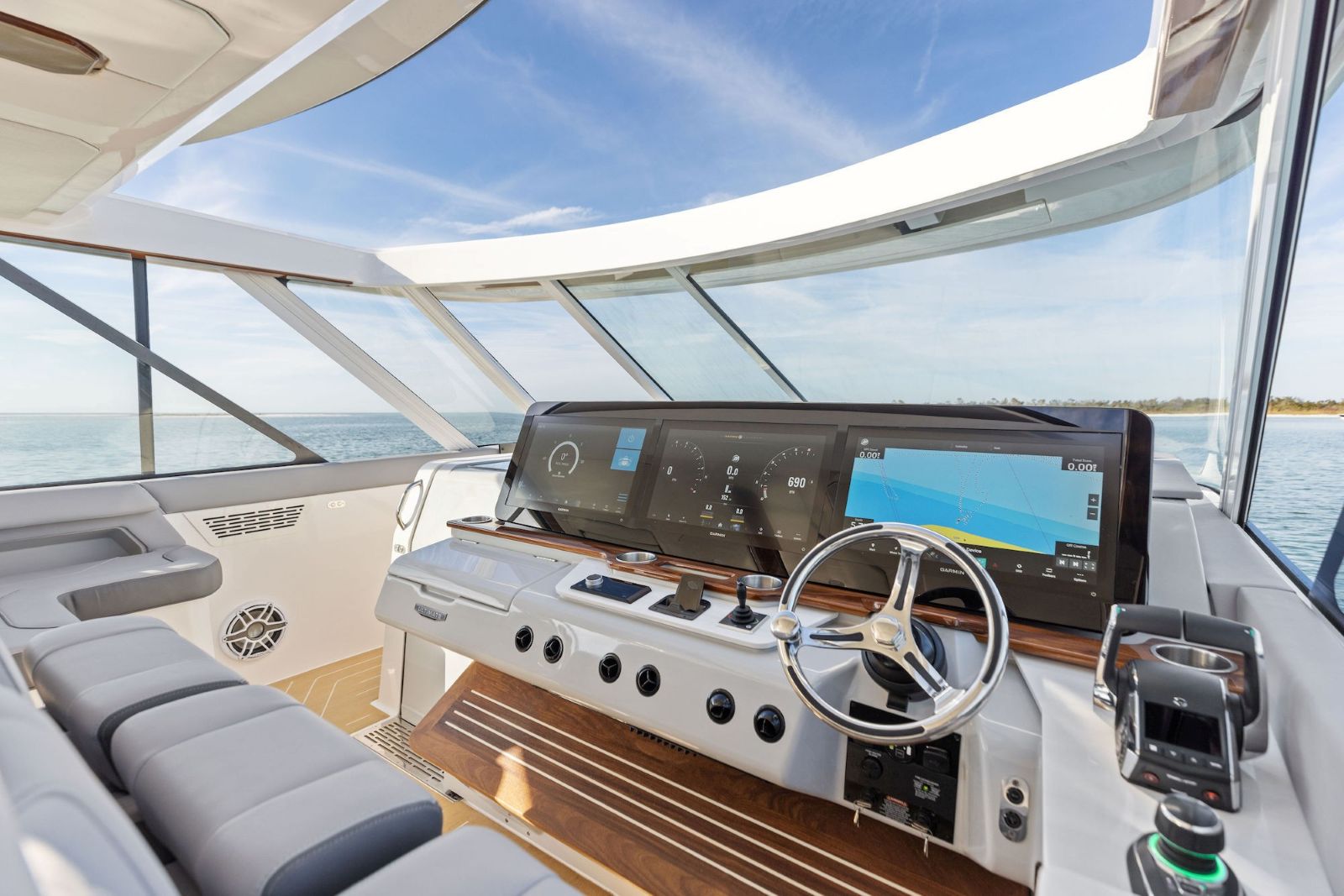 Regal LX43 control center with a trio of 22" Garmin touchscreens