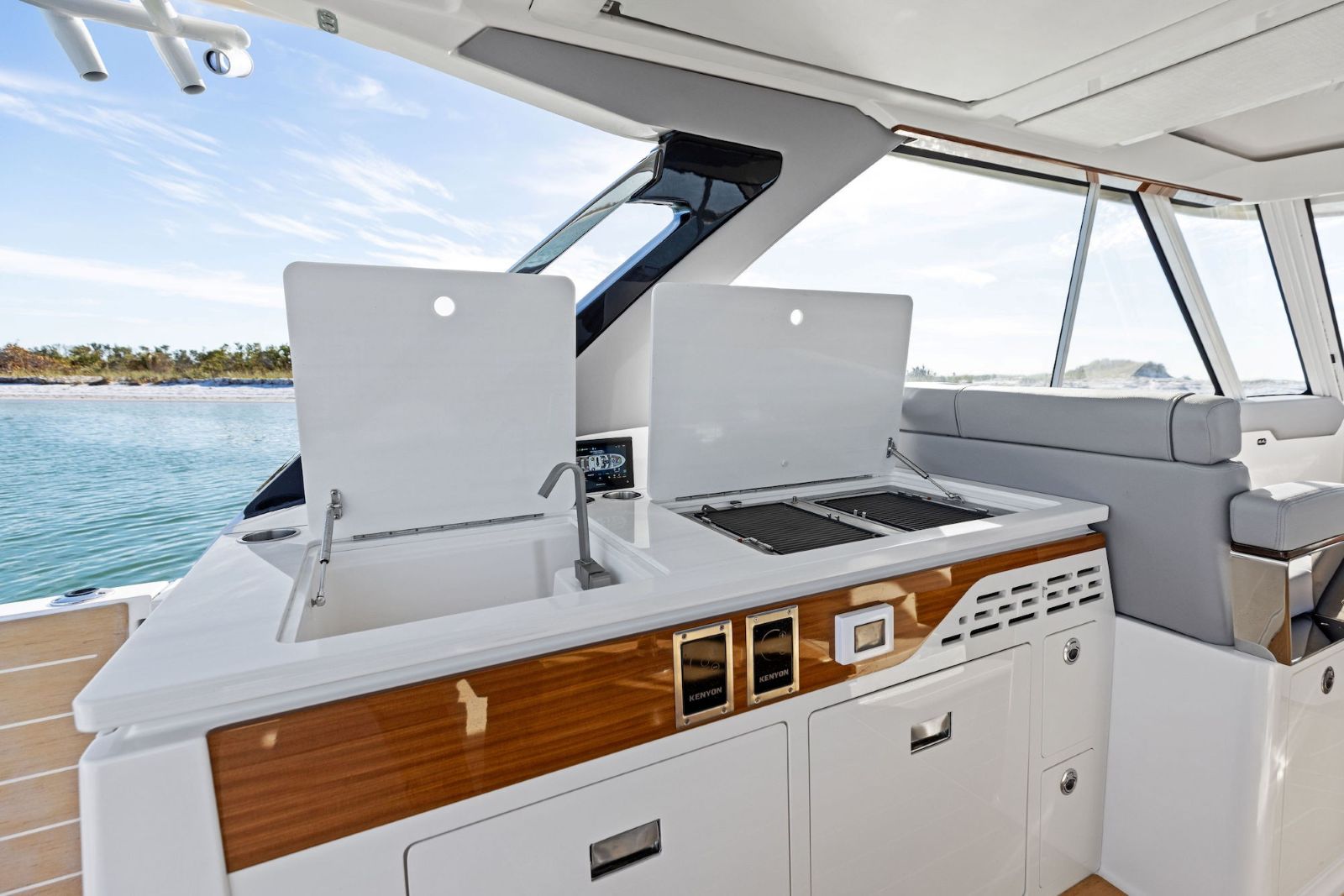 Regal LX43 galley offering a pair of electric grills, deep sink, and a duo of pull out refrigerators