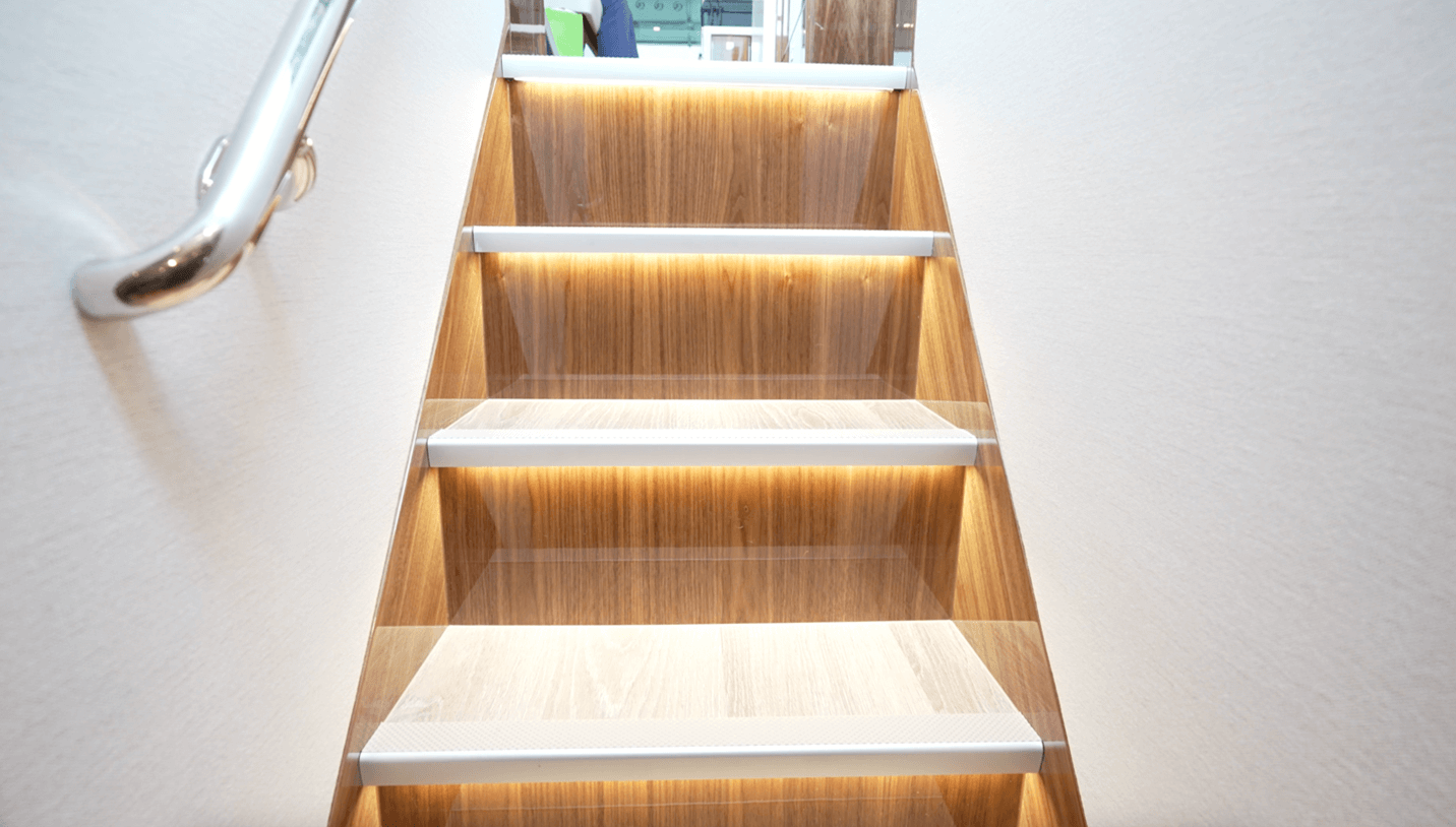 Steps from salon deck to accommodations atrium