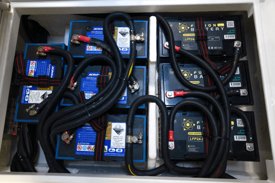 Different batteries are fitted for different tasks. AGM batteries for starting, Lithium Iron Phosphate for house power.