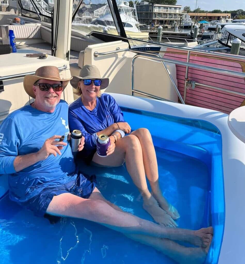 Captain Knox’s father, Robert Knox, and stepmother, Susan Rogers, aboard Vicarious cooling off in small pool of water