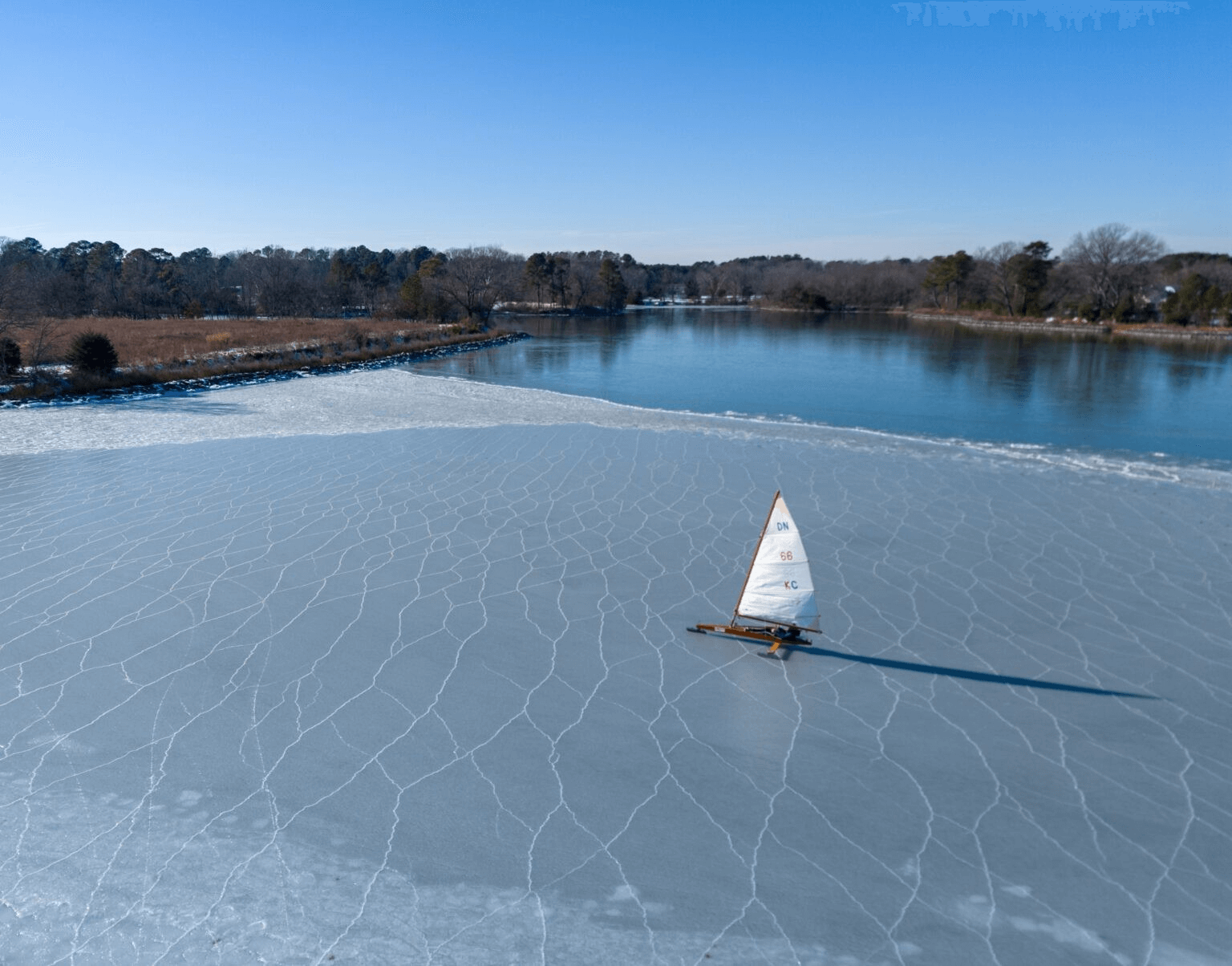 Sailors carefully measure the ice thickness when choosing where to launch their ice boats on the Miles River