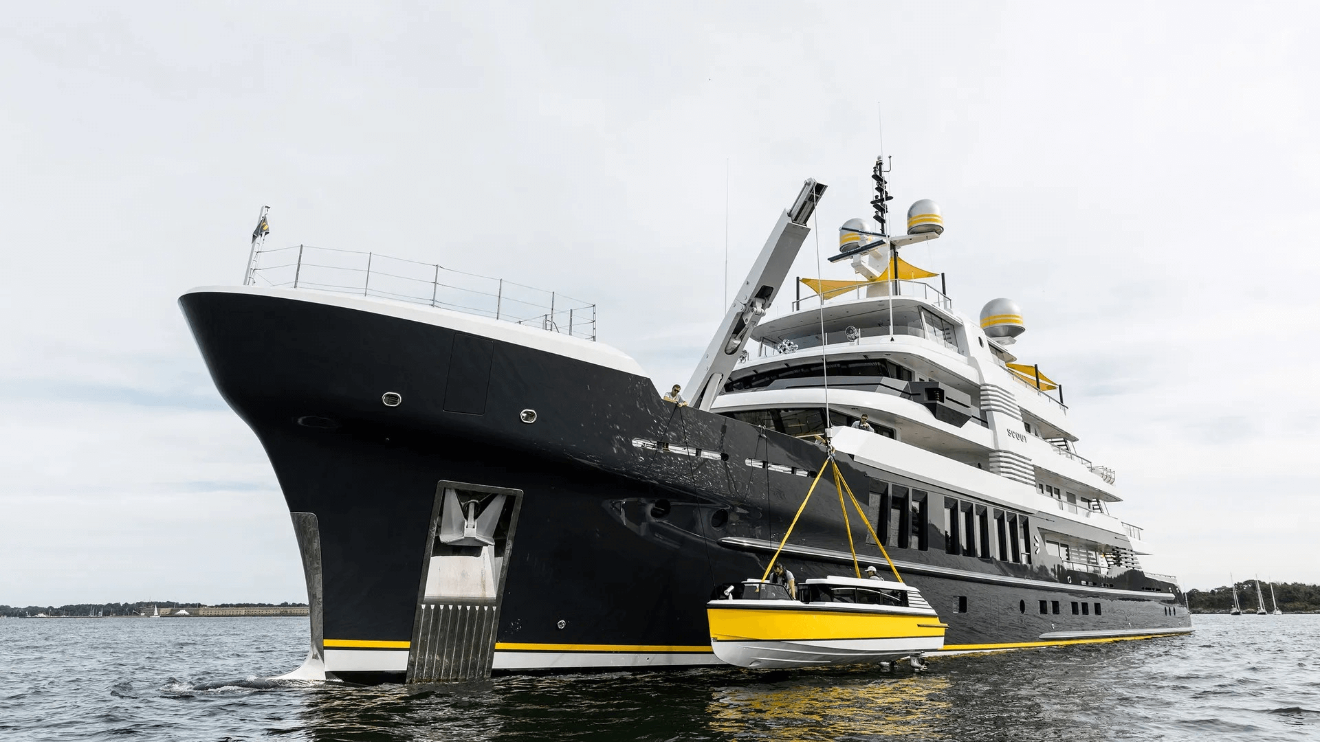 Superyacht Scout with tender at side