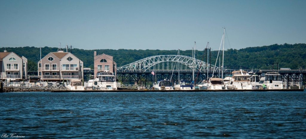 The steel arch of circa-1940 Thomas J. Hatem Bridge overlooks the 1906 Susquehanna River Rail Bridge, Havre De Grace