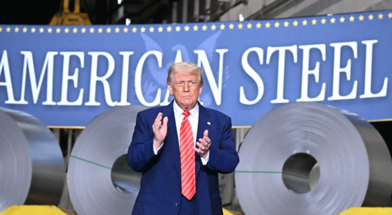 President Trump clapping in front of an American Steel sign