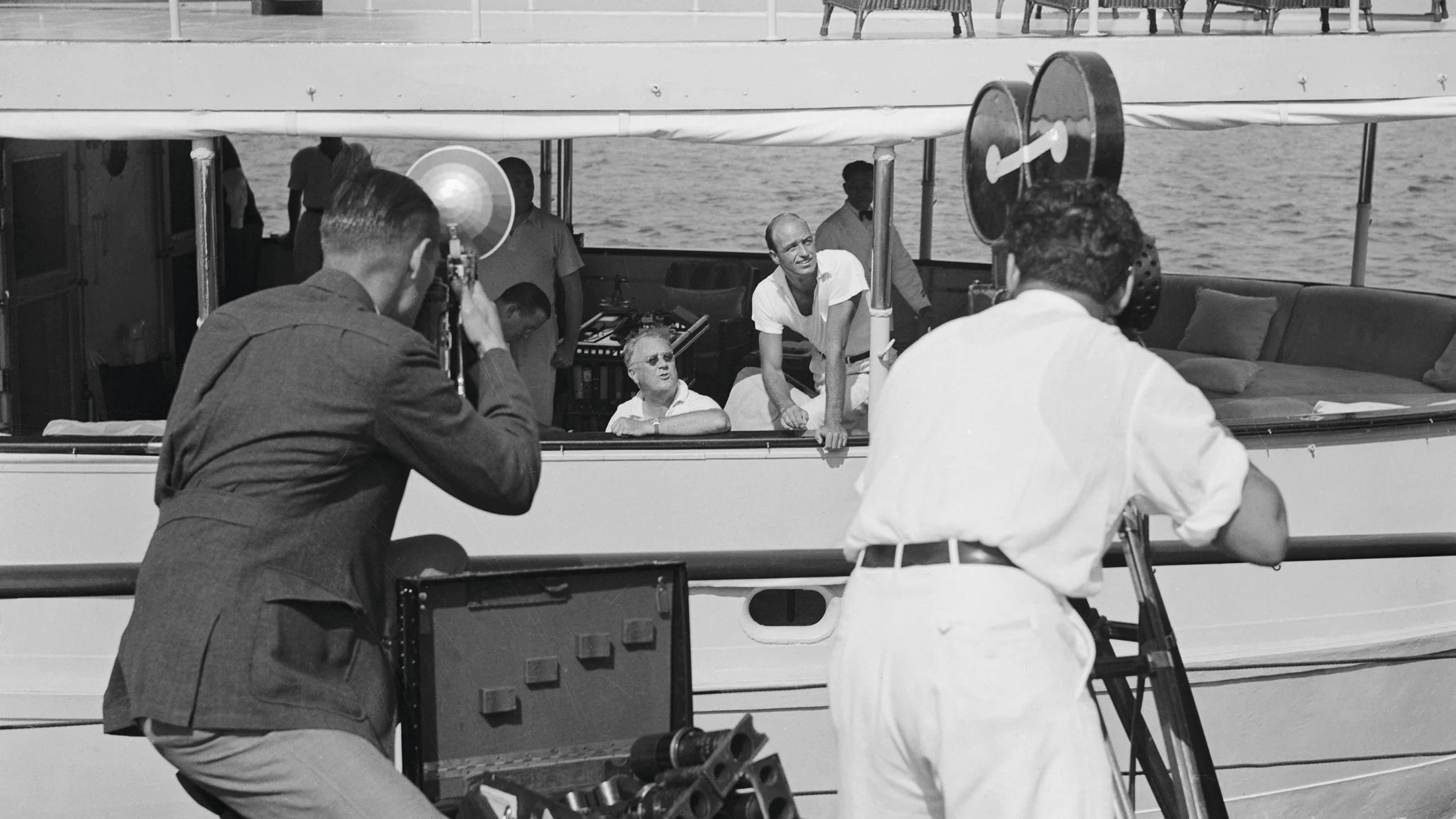 Photographers capture President Roosevelt on a fishing trip off Long Island