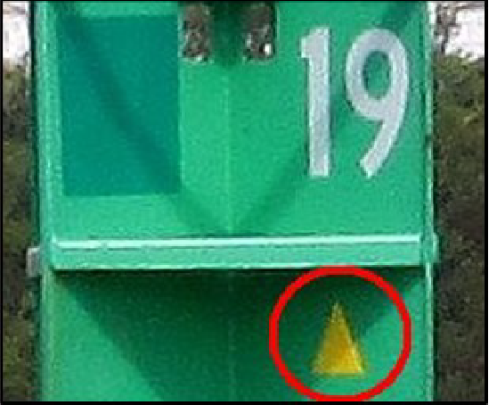Green ATON (can) with yellow triangle
