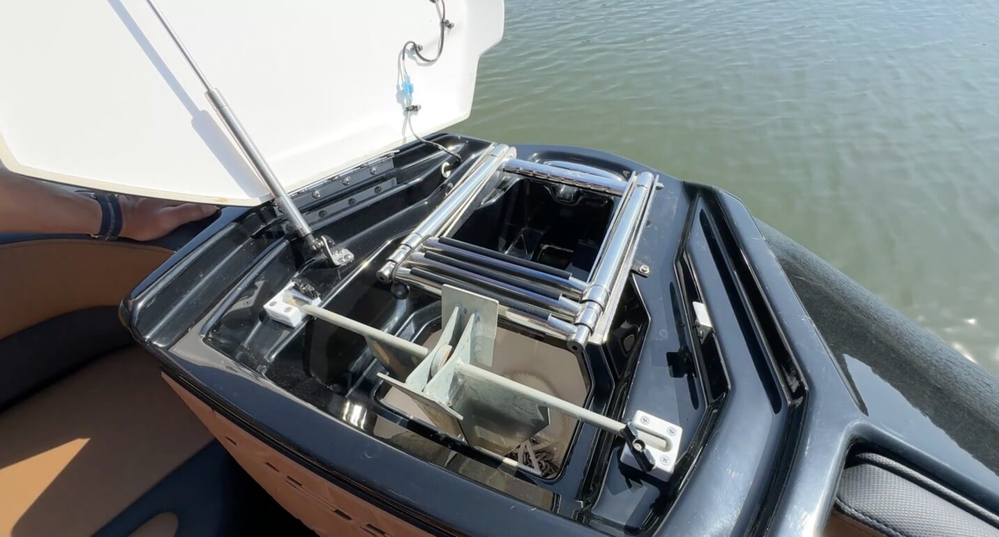 At the bow is the anchor locker with stainless telescoping boarding ladder, anchor, and rode.