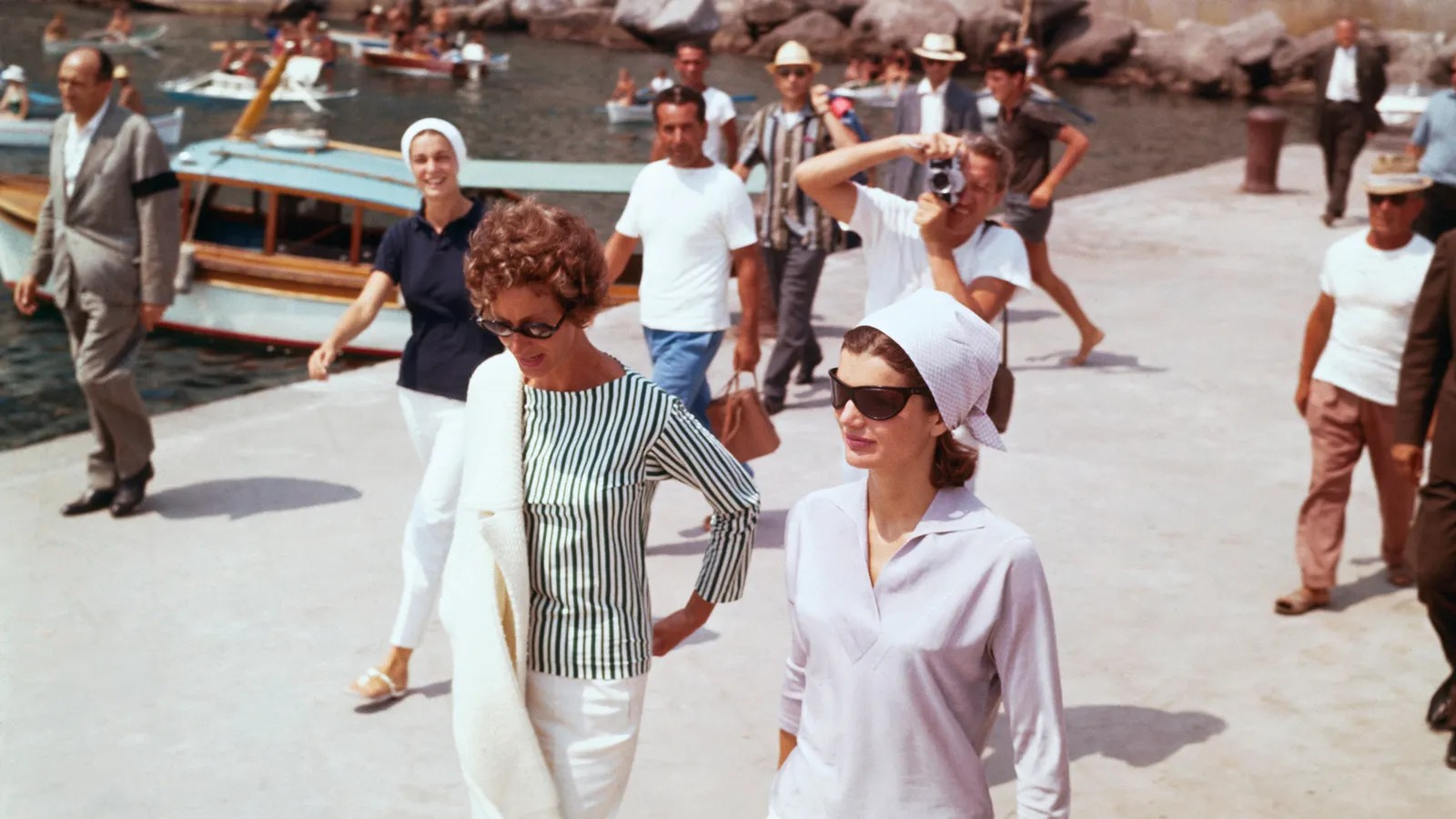 Marella Agnelli pictured here in 1962 with fellow Swan Jackie Kennedy in Amalfi Credit: Bettmann/Getty Images