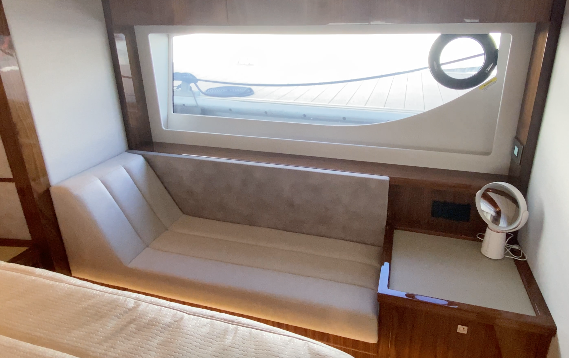 Riviera 645 SUV master sofa, hullside windows, lounge