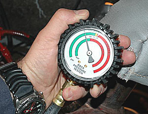 checking engine pressure, pressure gauge