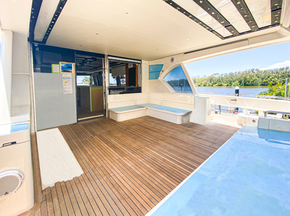 Riviera 78 aft deck, flying bridge overhang, teak decking