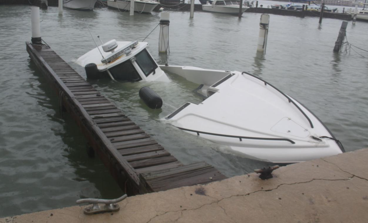 boat sunk in slip, sunken boat