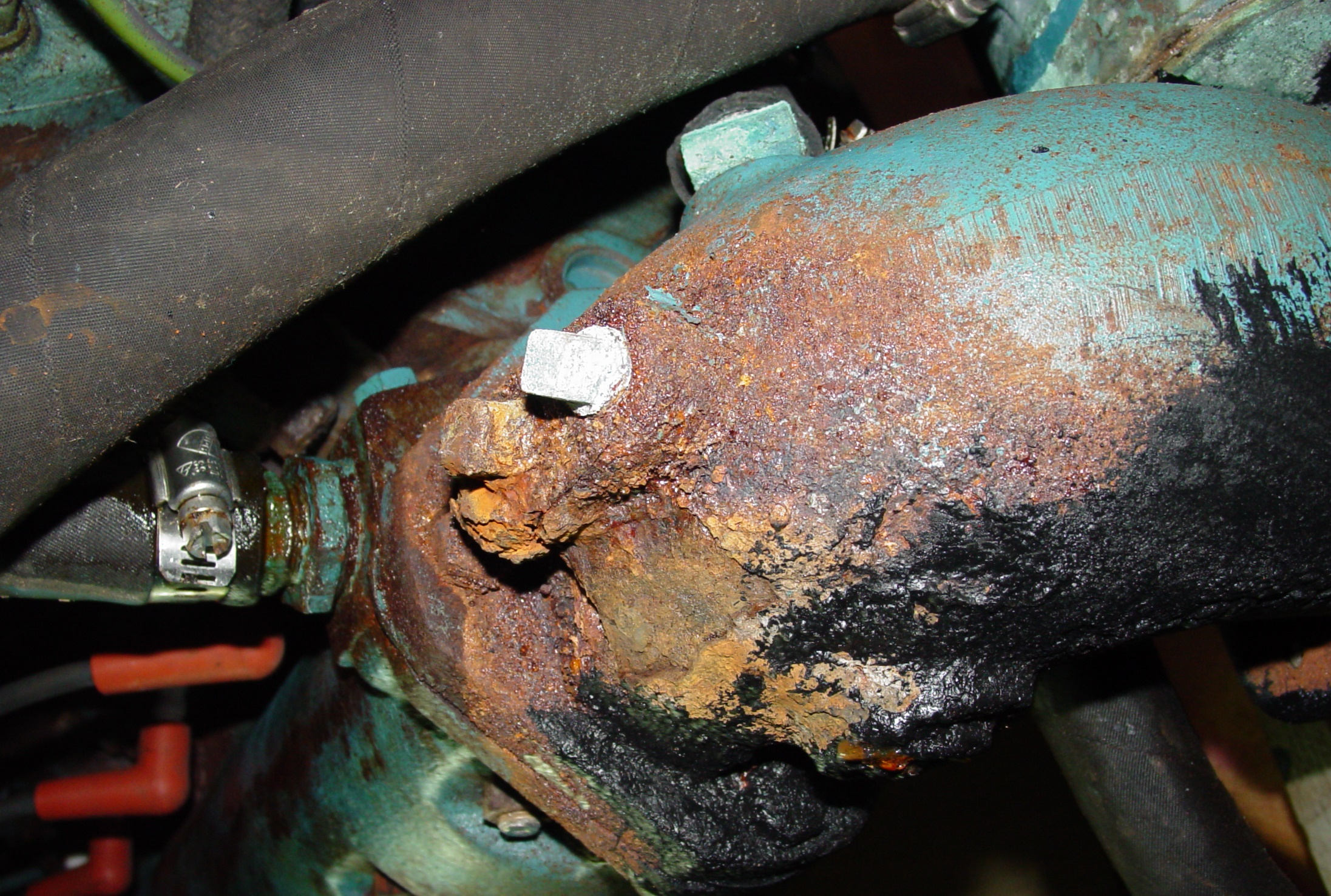 corroded marine exhaust, corroded inboard exhaust riser, rusted exhaust