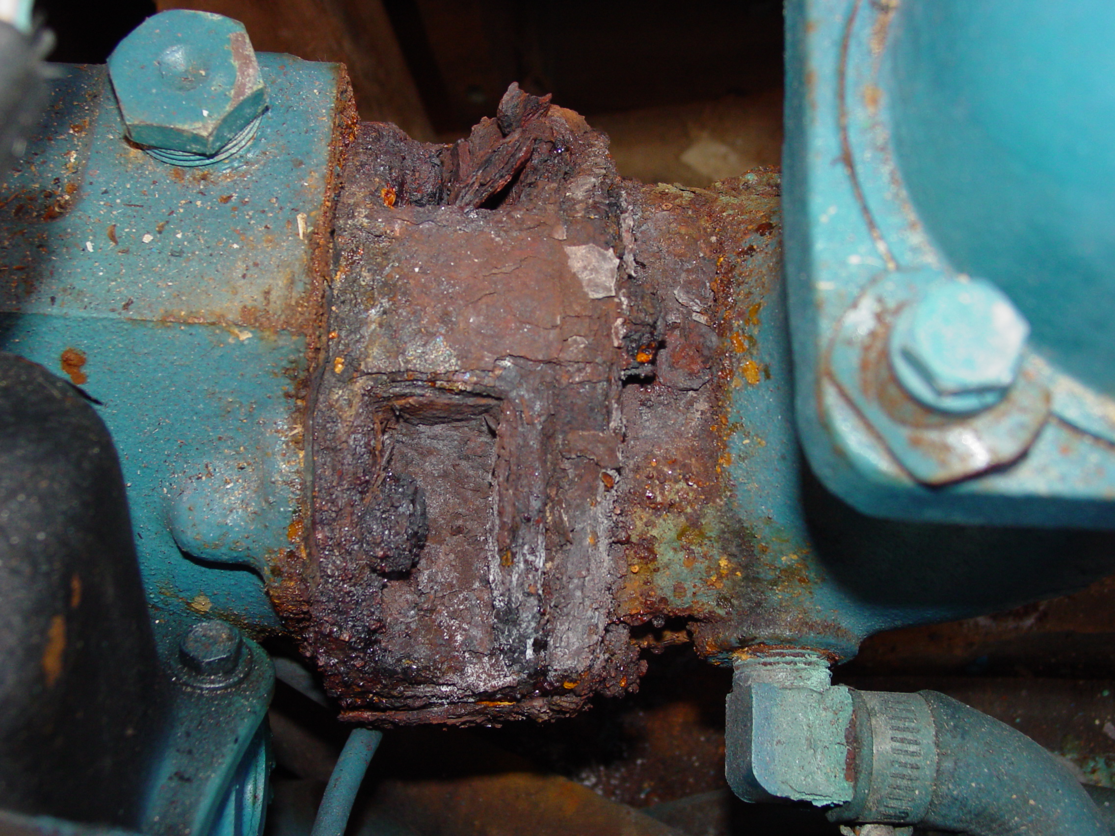 corroded manifold-riser joint, rusted exhaust joint