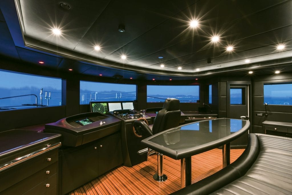 Yacht salon at night, LED lights in pilothouse