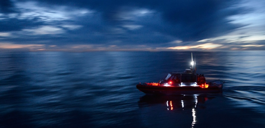 Boat at night, boat illuminated at night, night vision