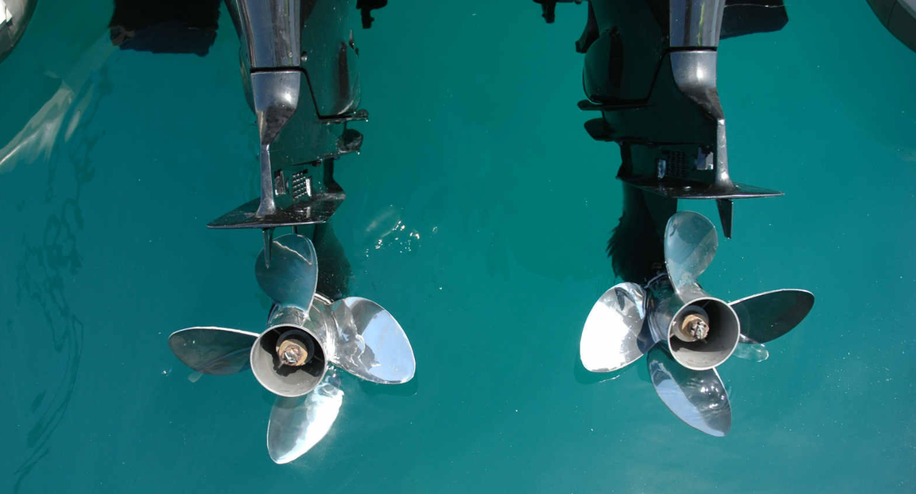 propellers on outboards, four-blade props, twin outboards