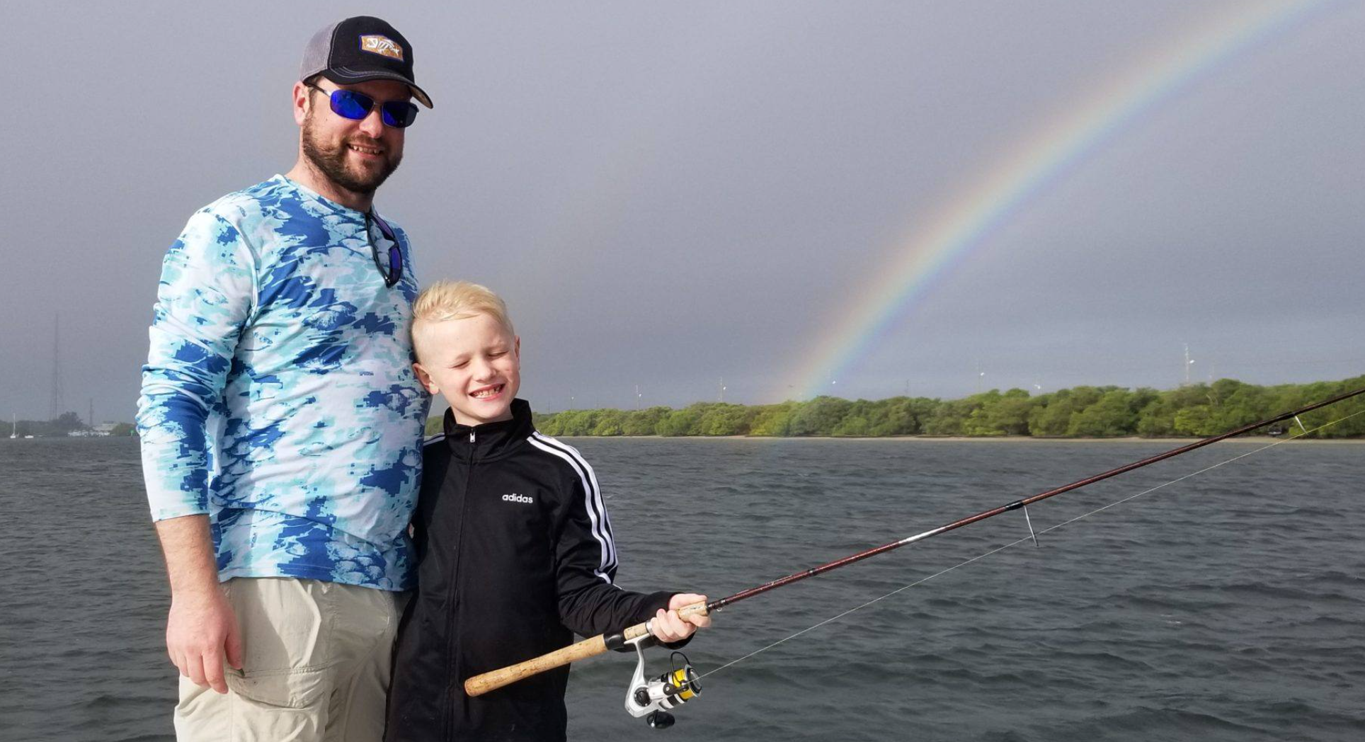 happy charter fishing customer, rainbow and fishing
