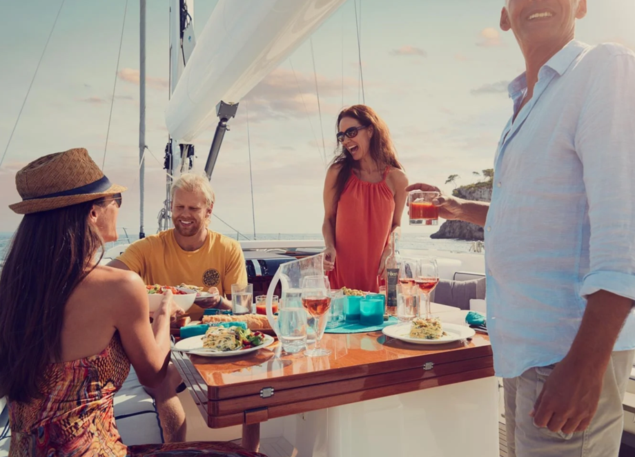 people dining on a boat, relaxing on a boat
