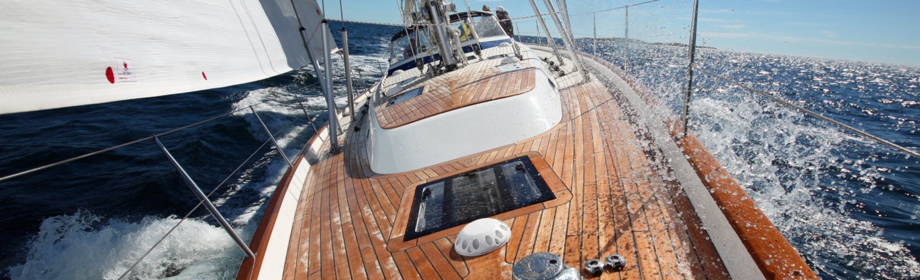 sailboat deck, teak deck, sailboat underway