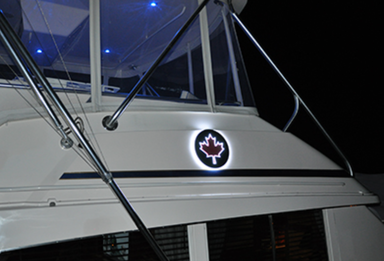 backlit symbols on a boat, custom-lit yacht