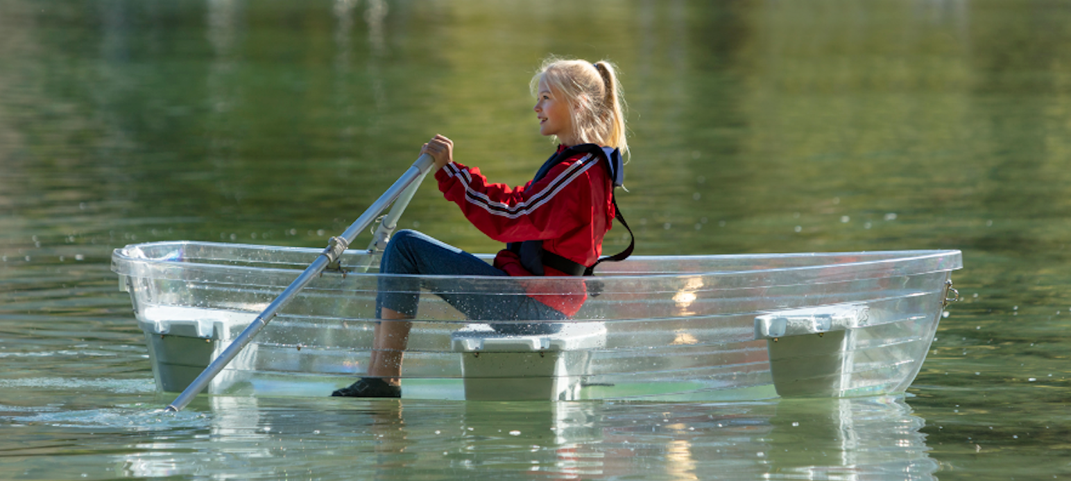 dinghy, tender, clear plastic dinghy, girl in a dinghy