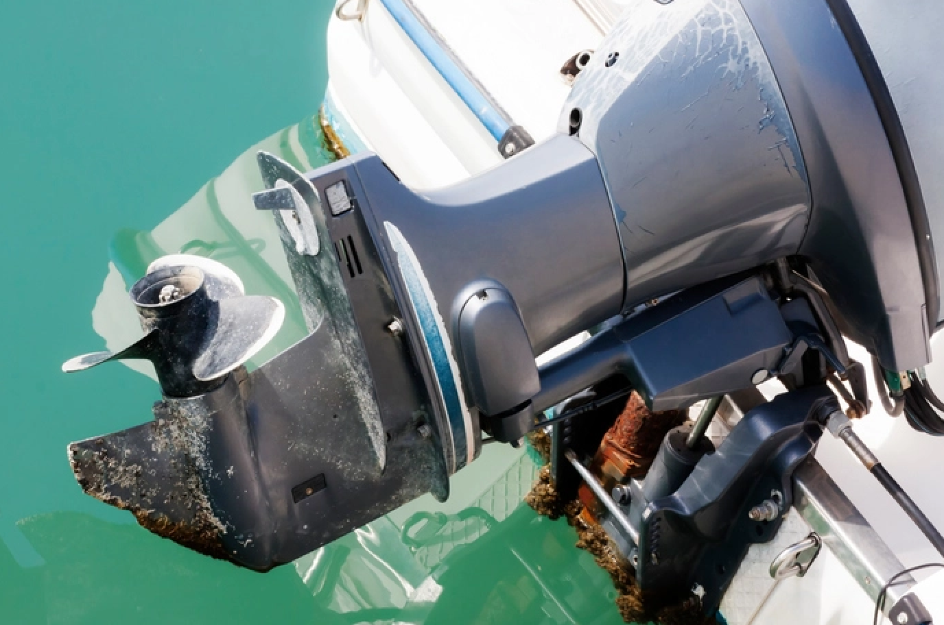 corroded outboard, corroded skeg, corrosion on outboard