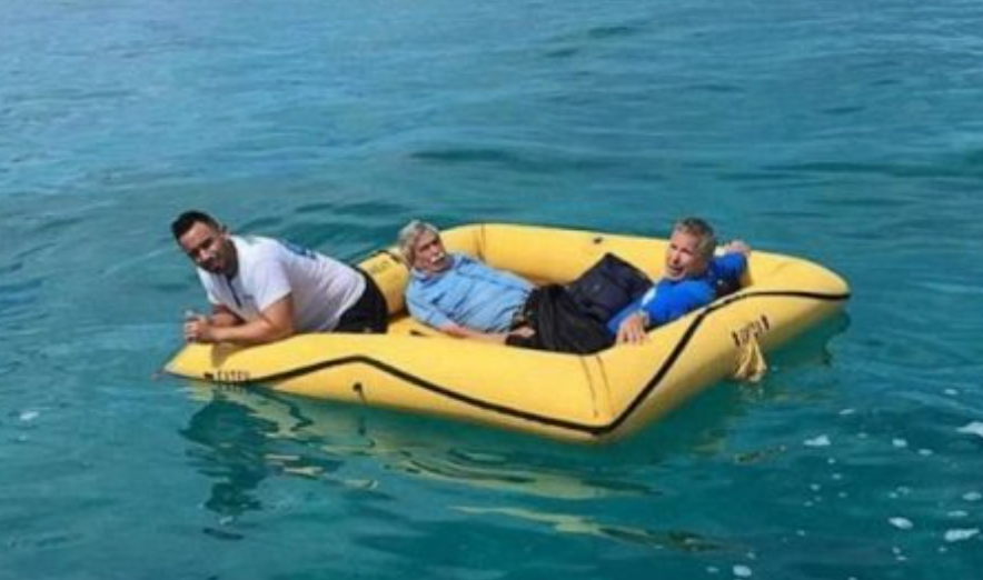 men in life raft, men rescued after plane crash