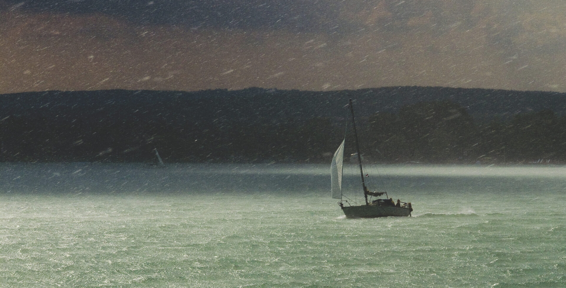 sailboat in a storm, sailing in a storm