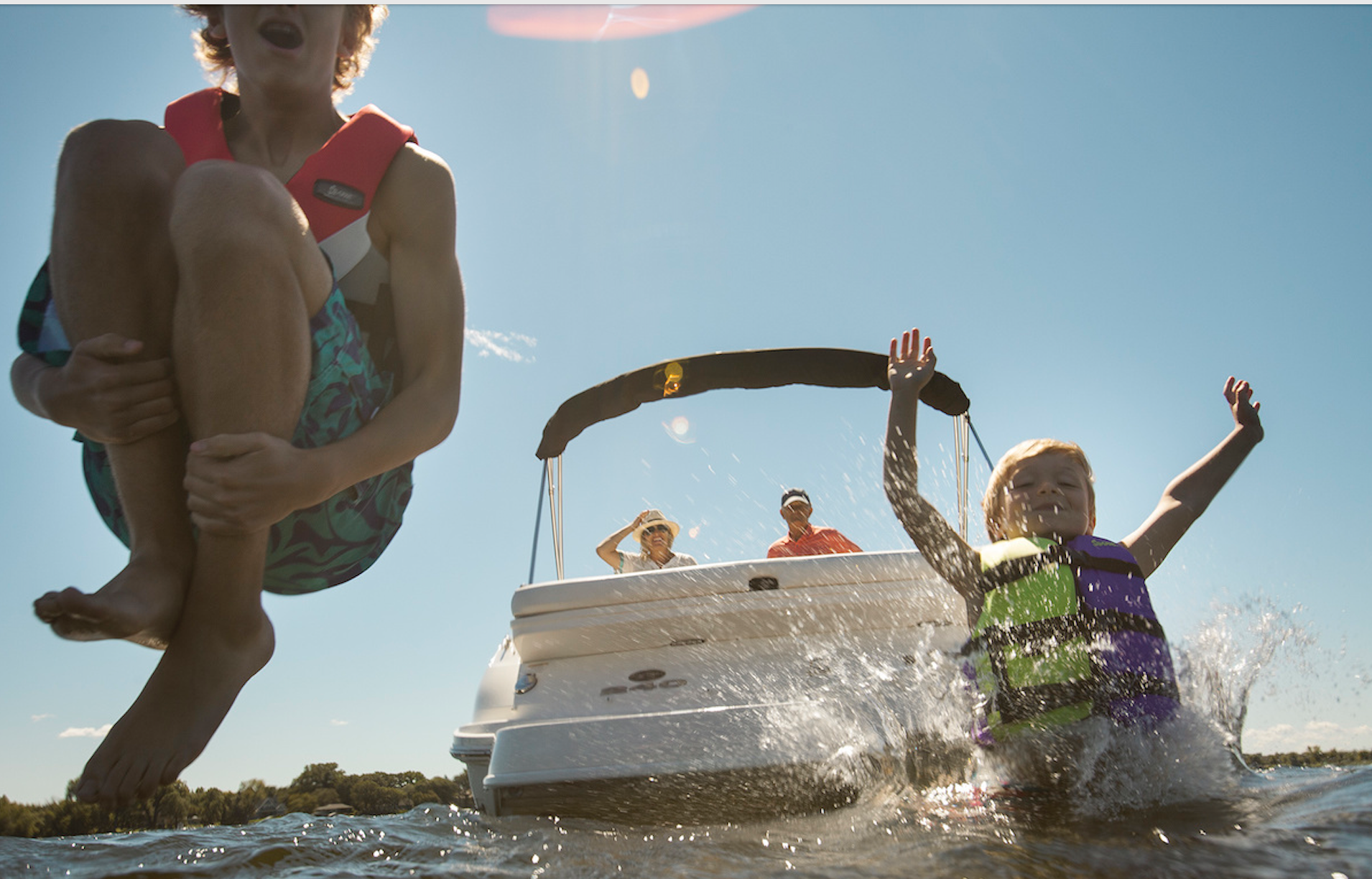 kids jumping off a boat, family fun on a boat