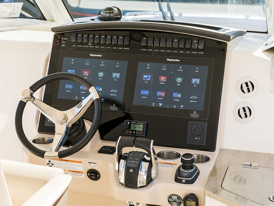 Boston Whaler helm, twin MFDs on a yacht, boat helm