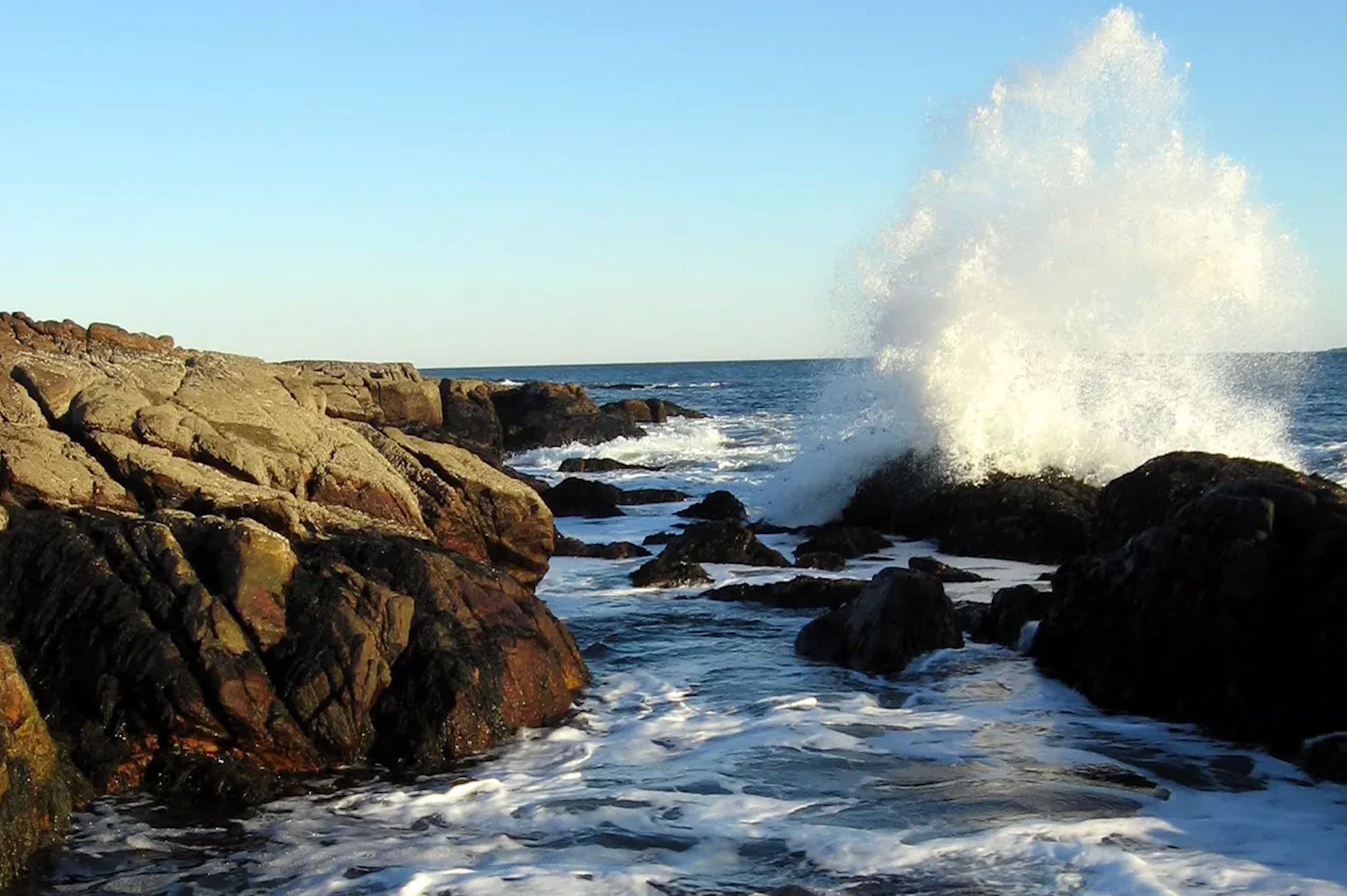 Ocean rocks, coastal rocks, wave crashing on rocks