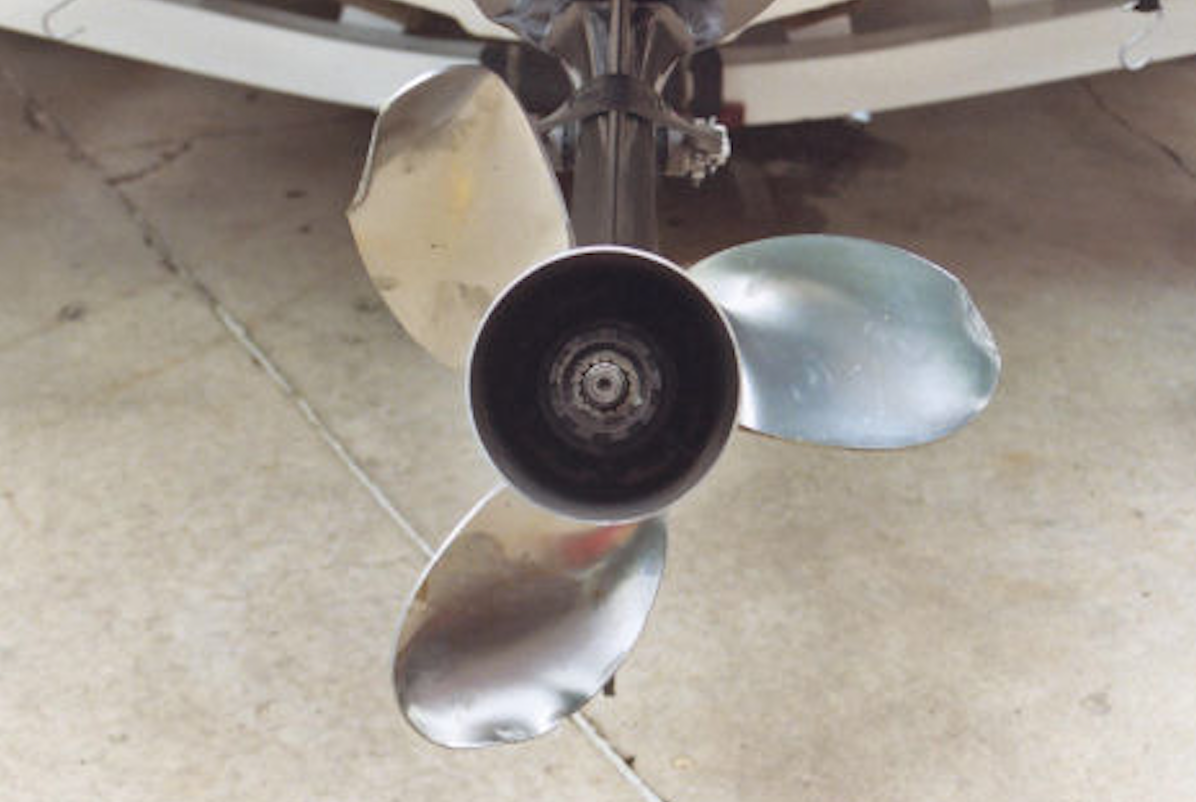 damaged stainless-steel boat propeller, bent propeller blades