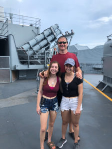 Dad and daughters touring the Battleship Wisconsin