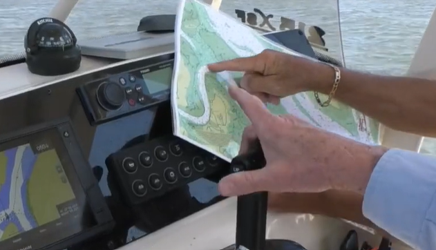 Looking at a map while boating
