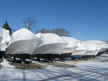 Boats covered with shrink wrap